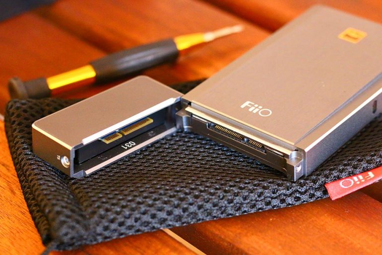 The newer FiiO Q5 allows you to swap out amp modules - and is fully Bluetooth | The Master Switch