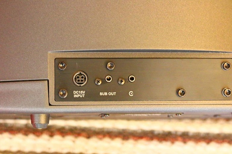 The rear of the BryFi, including subwoofer outlet | The Master Switch