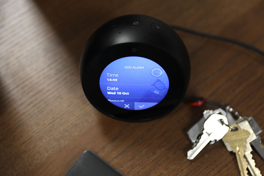 Setting an alarm is straightforward, whether by screen or voice | The Master Switch